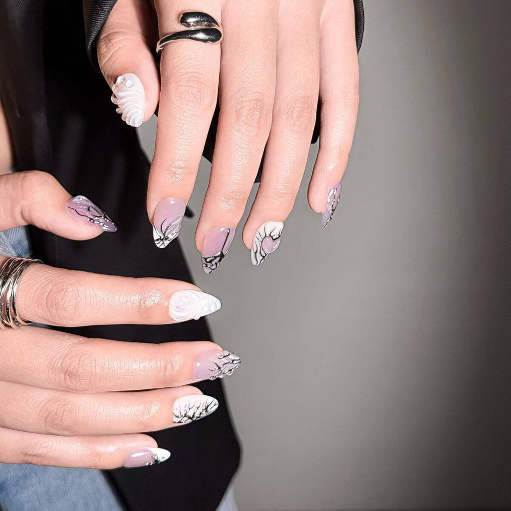Close-up of justmee press on nails showing the high-gloss lavender cat-eye and 3D textured gel. Perfect for a quick, reusable fake nail application without the salon wait time.