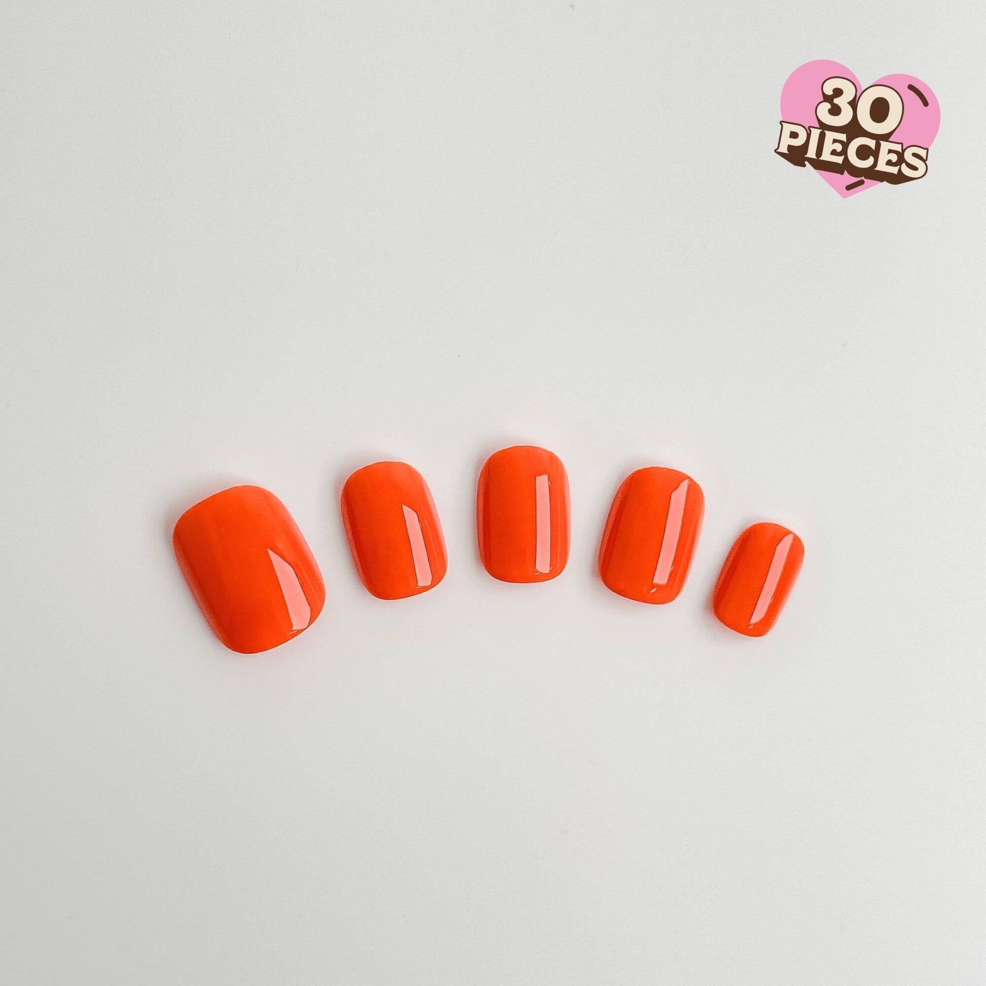 Row of five bright neon orange press-on nails in a short square shape
